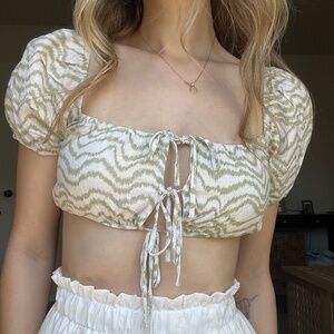 green wavy striped top